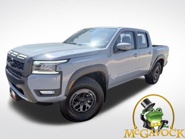 2025 Nissan Frontier PRO-4X in Boulder Gray Pearl — front three-quarter view
