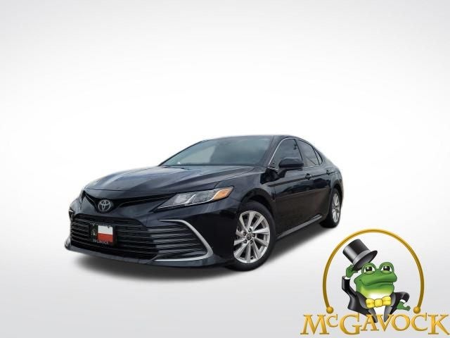 2021 Toyota Camry LE in Midnight Black Metallic — front three-quarter view